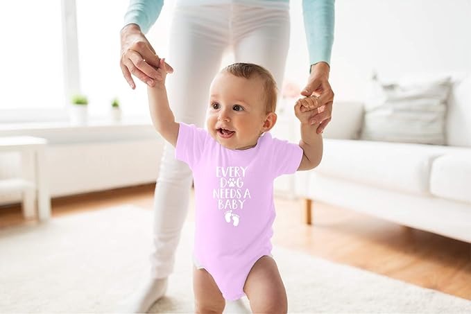 Every Dog Needs a Baby - Funny Baby Essentials Bodysuit - Baby Boy Clothes Newborn Girl Outfits