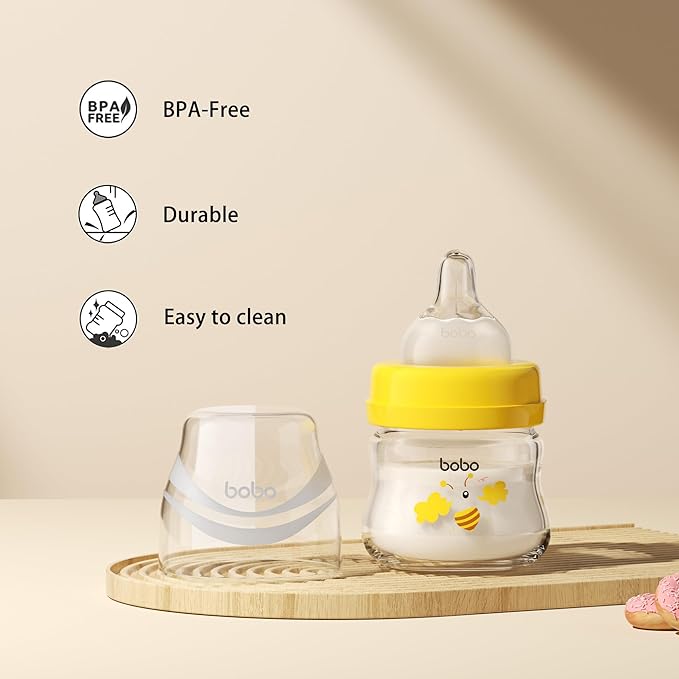 YOHKOH Glass Baby Bottles with Slow Flow Nipple, Newborn Anti-Colic Baby Bottles for 0+ Months, Wide Neck Feeding Bottle, Clear (Yellow, 2.7oz (Pack of 4))