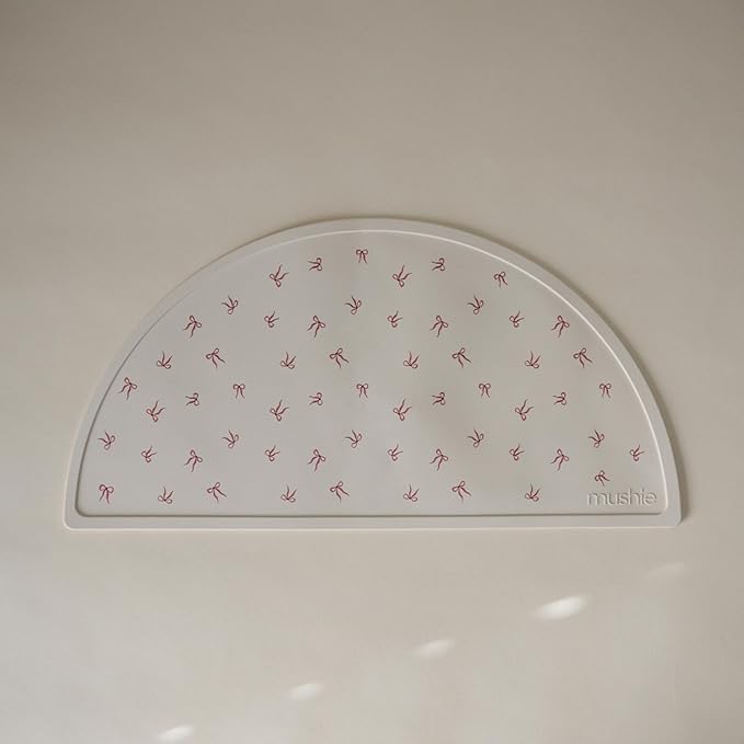mushie Silicone Placemat for Kids | BPA-Free Non-Slip Design (Bows)