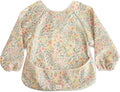 mushie Long Sleeve Baby Bib | Water Resistant Adjustable Fit for Ages 6-24 Months