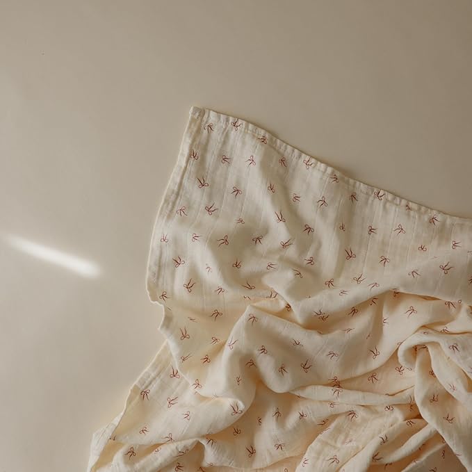 mushie Muslin Baby Swaddle Blanket | 100% Organic Cotton (Bows)